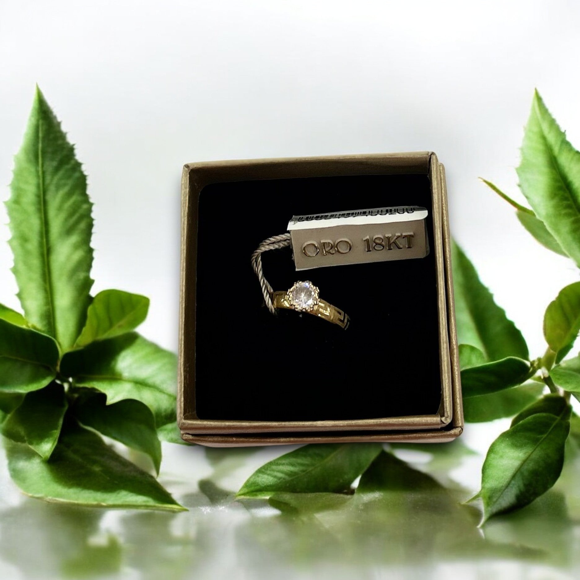 Anello in oro con trama greca - Oro 18 kt