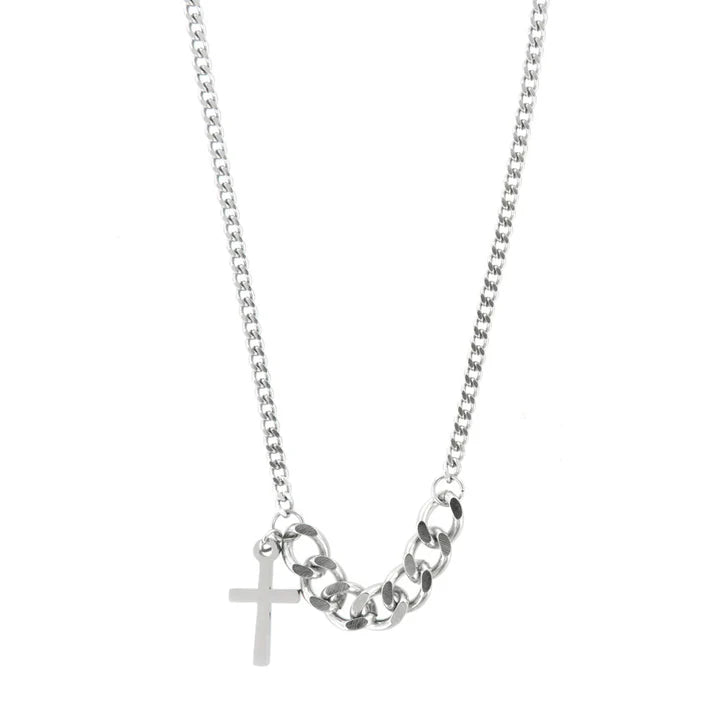 Collana in Acciaio a due grandezze di groumette, con pendente laterale a croce lucida.