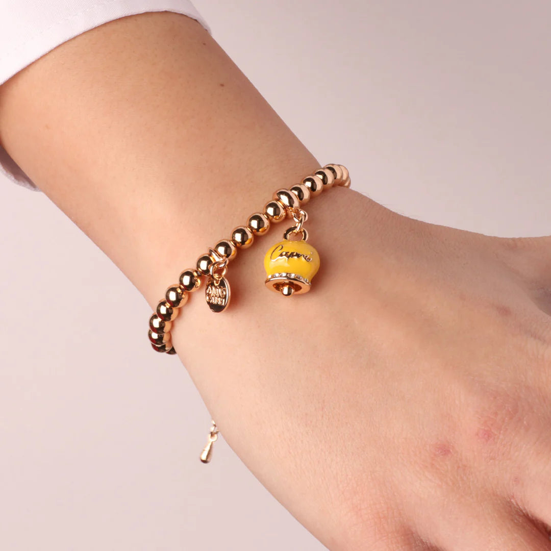 By Simon - Bracciale in Metallo con campanella gialla con scritta Capri e cristalli bianchi