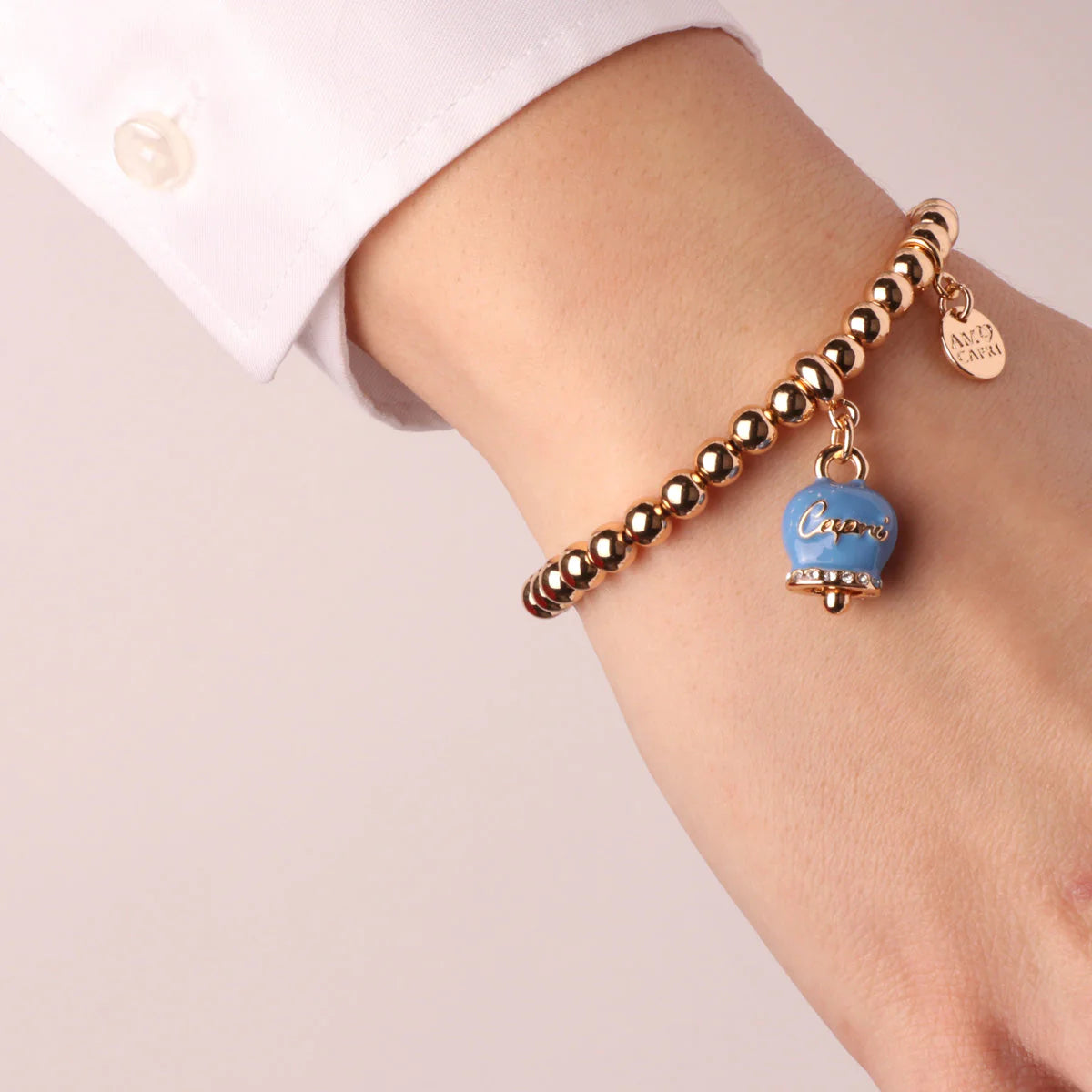 By Simon - Bracciale in Metallo con campanella portafortuna blu cobalto, con scritta Capri