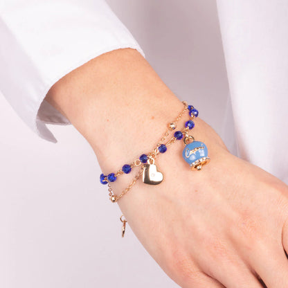 Bracciale in Metallo multifilo con pietre blu e campanella Capri blu